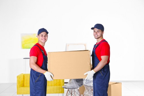 Removal van moving household items through Richmond upon Thames