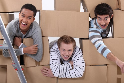 Professional movers loading household items for a Richmond upon Thames house move