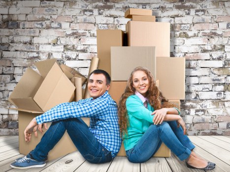 Trained movers handling items carefully in a Richmond upon Thames property