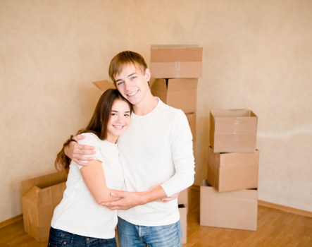 Packed boxes and furniture prepared for a flat move in Richmond upon Thames