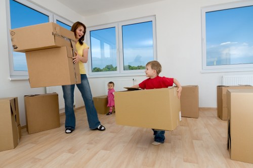 Unloading belongings into a new apartment during a Richmond upon Thames move
