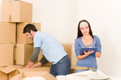 Commercial furniture and boxes prepared for an office move