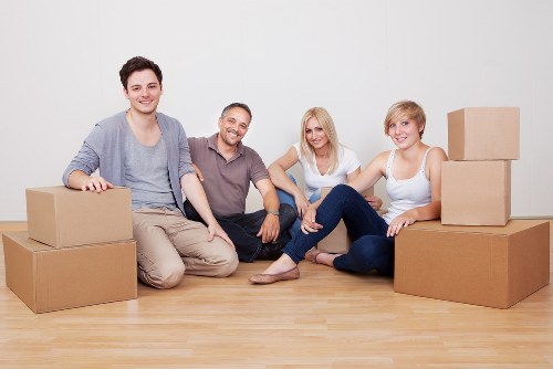Packed moving boxes and furniture for a local home relocation