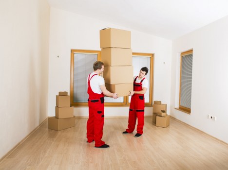 Removal team loading furniture and boxes for a same day move in Richmond upon Thames