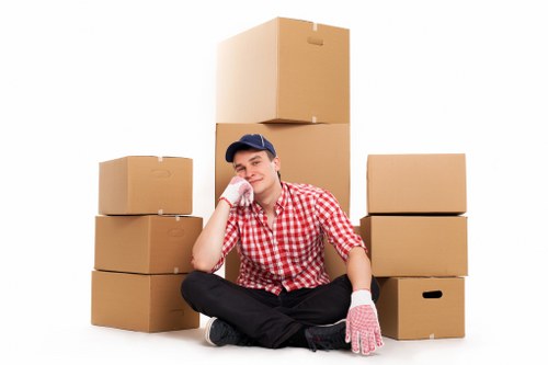 Local moving team handling boxes in Richmond upon Thames